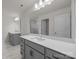 Bathroom featuring double vanity and large mirror at 4121 Walking Ridge Rd # 54, Charlotte, NC 28208