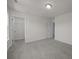 Spacious bedroom with carpet and closet access. The room features doors to closet and bathroom at 4121 Walking Ridge Rd # 54, Charlotte, NC 28208