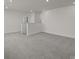Spacious bonus room with neutral carpet and access to other rooms at 4121 Walking Ridge Rd # 54, Charlotte, NC 28208