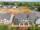 The property features townhomes with well-manicured front yards and a newly constructed look at 4121 Walking Ridge Rd # 54, Charlotte, NC 28208