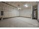A large garage ready for your vehicles and storage space. Features a hot water tank at 4121 Walking Ridge Rd # 54, Charlotte, NC 28208