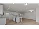 The kitchen features a white island, stainless steel dishwasher, and recessed ceiling lights at 4121 Walking Ridge Rd # 54, Charlotte, NC 28208