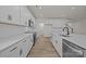 The modern kitchen offers stainless steel appliances, and white cabinets at 4121 Walking Ridge Rd # 54, Charlotte, NC 28208