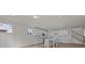 Bright kitchen featuring white cabinets, a center island, modern fixtures, and hardwood floors at 4121 Walking Ridge Rd # 54, Charlotte, NC 28208