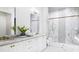 Luxurious bathroom with double vanity, large shower, and marble tile at 4165 Eastover Glen Rd # 0337, Charlotte, NC 28269