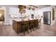 Modern kitchen boasts a large island, stainless steel appliances, and hardwood floors at 4165 Eastover Glen Rd # 0337, Charlotte, NC 28269