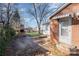 Brick home with backyard patio and firepit at 437 Brevard St, Statesville, NC 28677
