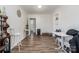 Charming dining area with wood floors and access to the kitchen and bathroom at 437 Brevard St, Statesville, NC 28677