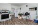 Kitchen with white cabinets, wood floors, and appliances at 437 Brevard St, Statesville, NC 28677