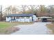 Newly renovated white ranch house with a carport and a gravel driveway at 6726 Lockhart Rd, Sharon, SC 29742
