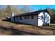 Ranch house with black trim and wooded backyard at 6726 Lockhart Rd, Sharon, SC 29742