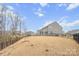 Landscaped backyard with a view of the neighborhood and trees at 800 Landau Rd, Waxhaw, NC 28173