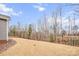 Expansive backyard with a sloped yard and a black fence at 800 Landau Rd, Waxhaw, NC 28173