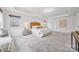 Spacious bedroom with carpeted floor and large windows at 800 Landau Rd, Waxhaw, NC 28173