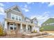 Two-story house with gray siding, stone accents, and a two-car garage at 800 Landau Rd, Waxhaw, NC 28173