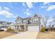 Two-story house with gray siding, stone accents, and a two-car garage at 800 Landau Rd, Waxhaw, NC 28173