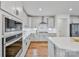 Modern kitchen with large island and stainless steel appliances at 800 Landau Rd, Waxhaw, NC 28173
