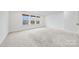 Spacious loft area with carpeted floor and window at 800 Landau Rd, Waxhaw, NC 28173