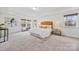 Large main bedroom with carpeted floor and windows at 800 Landau Rd, Waxhaw, NC 28173