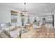 Open concept sitting area with view into the kitchen at 800 Landau Rd, Waxhaw, NC 28173