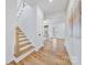 Modern staircase with light wood and white risers at 800 Landau Rd, Waxhaw, NC 28173