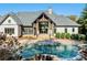 Gorgeous pool and outdoor living space with screened porch at 9809 Saddle Ave, Waxhaw, NC 28173