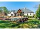 Stunning backyard with pool, waterfall feature, and manicured landscaping at 9809 Saddle Ave, Waxhaw, NC 28173