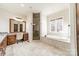 Beautiful bathroom featuring a soaking tub and glass enclosed shower at 9809 Saddle Ave, Waxhaw, NC 28173