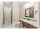 Bright bathroom with granite countertop, a glass-enclosed shower, and neutral tiling for a clean, modern look at 9809 Saddle Ave, Waxhaw, NC 28173