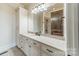 Bathroom featuring a spacious vanity with granite countertops and ample storage at 9809 Saddle Ave, Waxhaw, NC 28173
