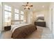 Bright bedroom with natural light, neutral colors, and plush rug at 9809 Saddle Ave, Waxhaw, NC 28173