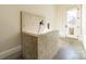 Dog wash station with tile surround and door to the exterior for convenience at 9809 Saddle Ave, Waxhaw, NC 28173