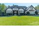 Stunning home with a spacious lawn and stone accents at 9809 Saddle Ave, Waxhaw, NC 28173