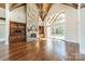 Living room with hardwood floors, stone fireplace and high ceilings at 9809 Saddle Ave, Waxhaw, NC 28173