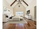 Elegant bedroom with high ceilings, large windows and hardwood floors at 9809 Saddle Ave, Waxhaw, NC 28173