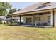 Large covered patio, perfect for outdoor dining and relaxation at 1021 Three Lakes Trl, Waxhaw, NC 28173