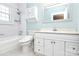 Bathroom with white vanity, bathtub, and shower at 106 Patrick St, Gastonia, NC 28054