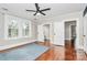 Hardwood floor bedroom with access to closet and another room at 106 Patrick St, Gastonia, NC 28054