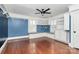 Bedroom with built-in window seat and shelving, hardwood floors at 106 Patrick St, Gastonia, NC 28054