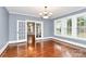 Bright dining room with hardwood floors and views to backyard at 106 Patrick St, Gastonia, NC 28054