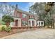 Two story brick home with a large front porch at 106 Patrick St, Gastonia, NC 28054