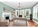 Bright home office features built-in shelves, fireplace, and hardwood floors at 106 Patrick St, Gastonia, NC 28054