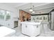 Kitchen with island, brick fireplace, and stainless steel appliances at 106 Patrick St, Gastonia, NC 28054