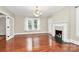 Living room with hardwood floors and fireplace at 106 Patrick St, Gastonia, NC 28054