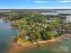 Aerial view of a lakefront community with many houses and water access at 109 Raspberry Ln, Mooresville, NC 28117