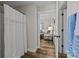 Simple bathroom with shower and view into living room at 1278 Burrell Rd, Clover, SC 29710