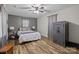 Spacious bedroom with wood-look floors and a large safe at 1278 Burrell Rd, Clover, SC 29710