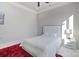 Bedroom with plush rug and modern white furniture at 15650 Youngblood Rd, Charlotte, NC 28278