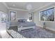 Bright bedroom with plush carpet and large windows at 15650 Youngblood Rd, Charlotte, NC 28278