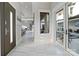 Elegant entryway with marble floors and access to pool at 15650 Youngblood Rd, Charlotte, NC 28278